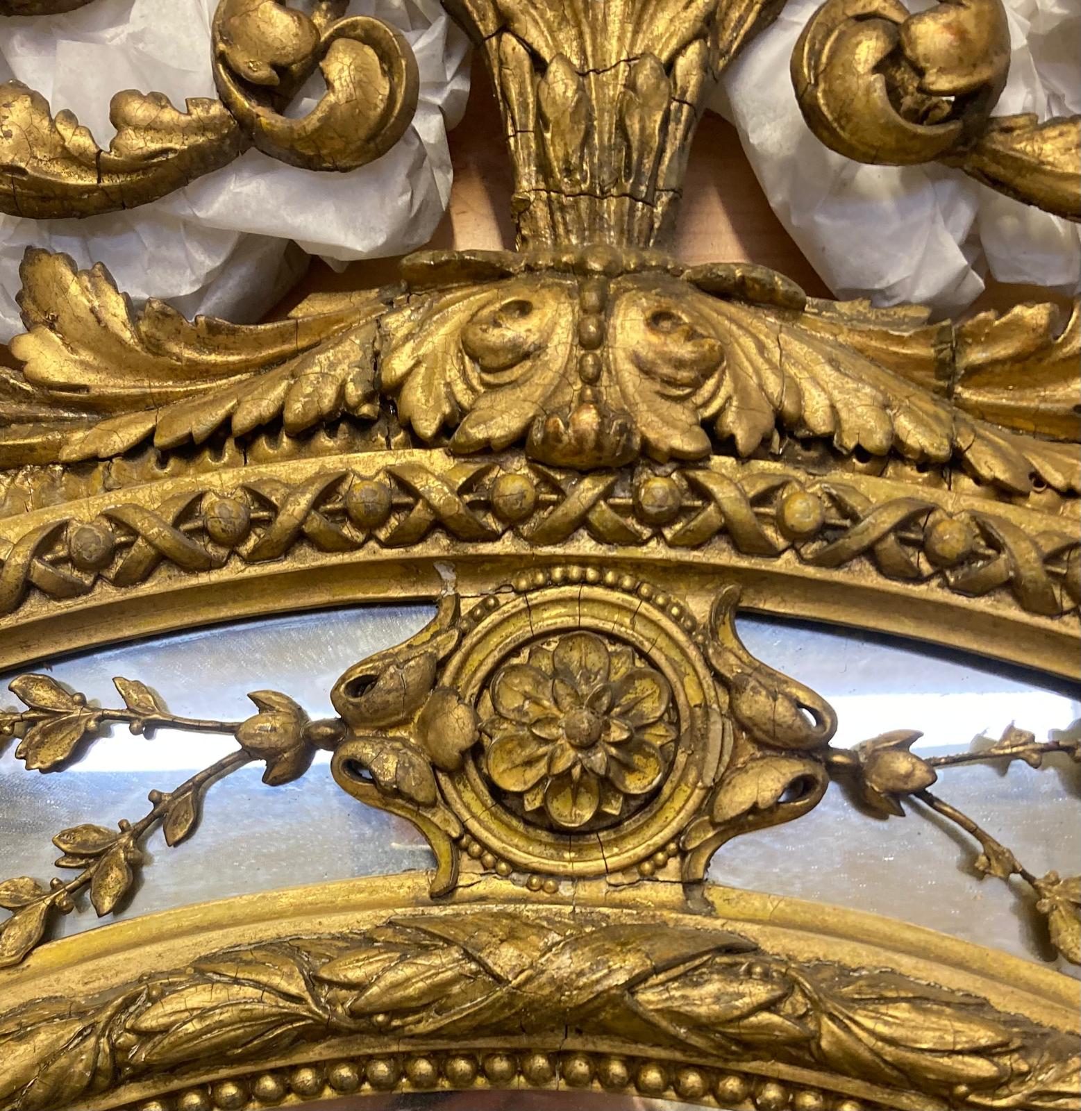 A large George lll gilt wood oval mirror. The frame with urn cresting and floral and foliate scrolls - Image 11 of 21