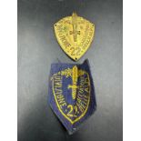 A WWII 22nd Infantry Division Hunters of the Alps sleeve badge and a clothe badge