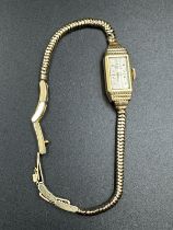 A 9ct Ladies rotary watch on 9ct gold bracelet, with an approximate total weight of 13.4g