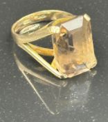 A 14ct gold and smokey quartz ring with an approximate weight of 7.9g
