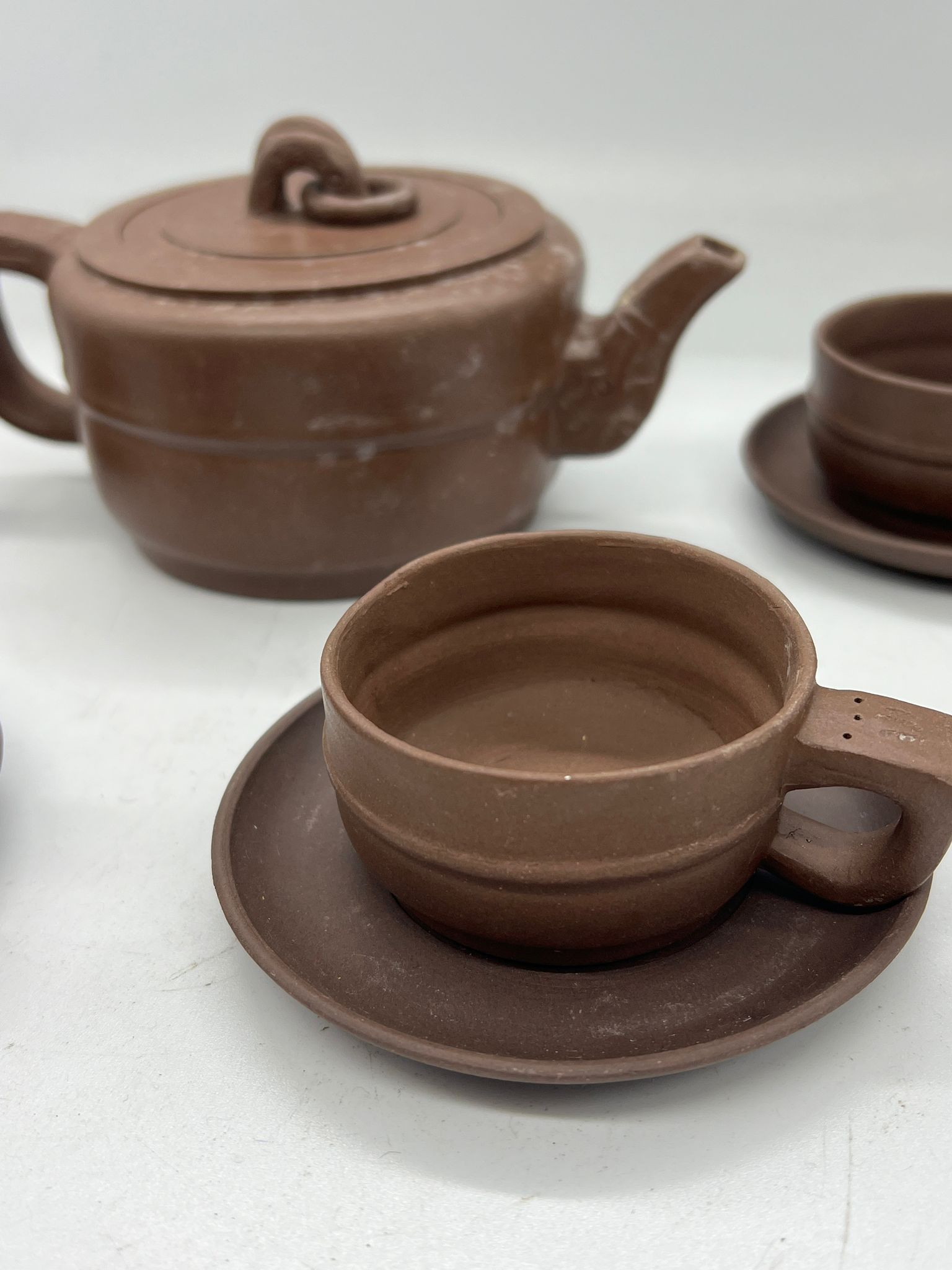 A Chinese clay tea set comprising of four cups and saucers and one teapot - Image 2 of 4