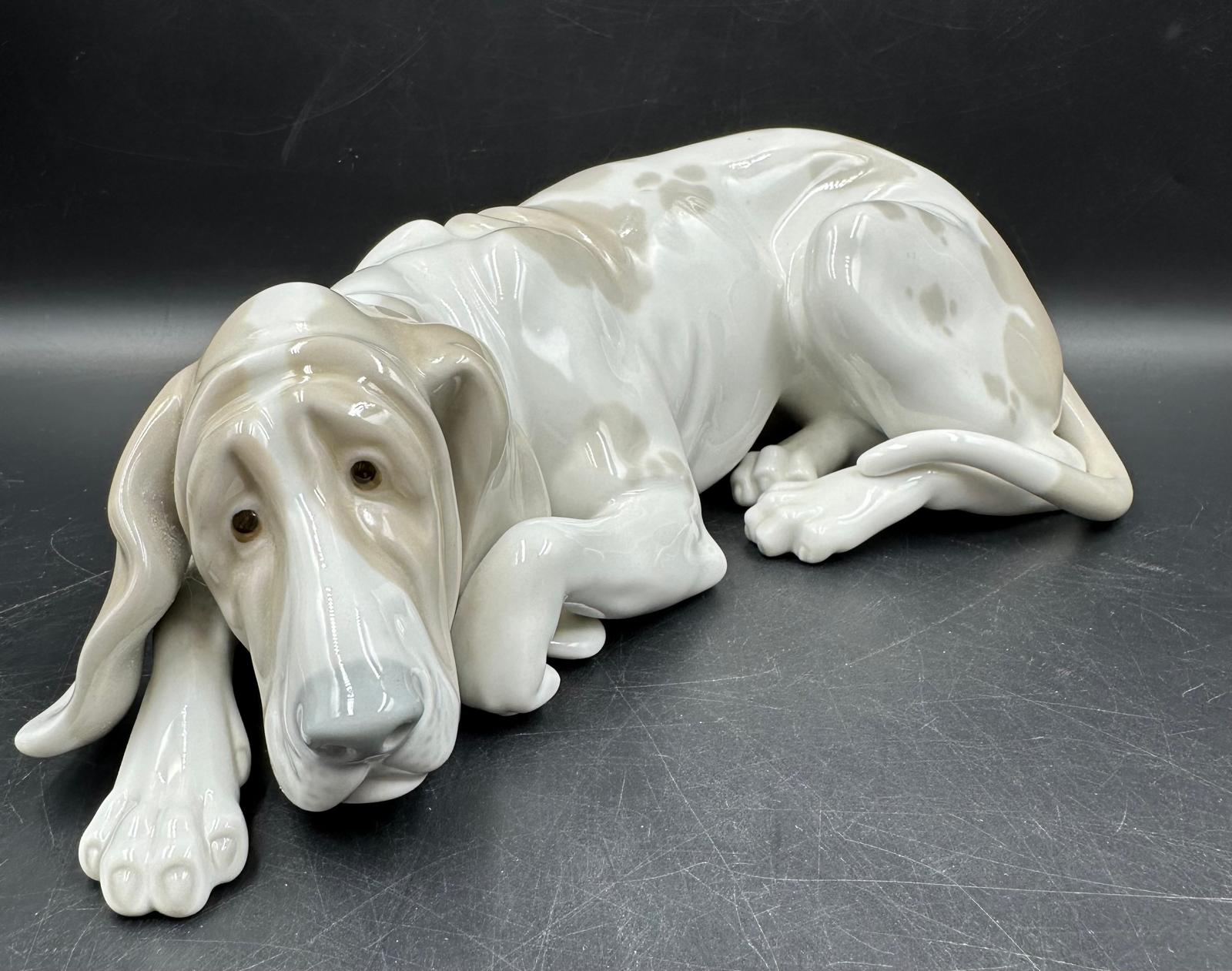 A Lladro figure of an old dog Number 1067