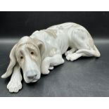 A Lladro figure of an old dog Number 1067