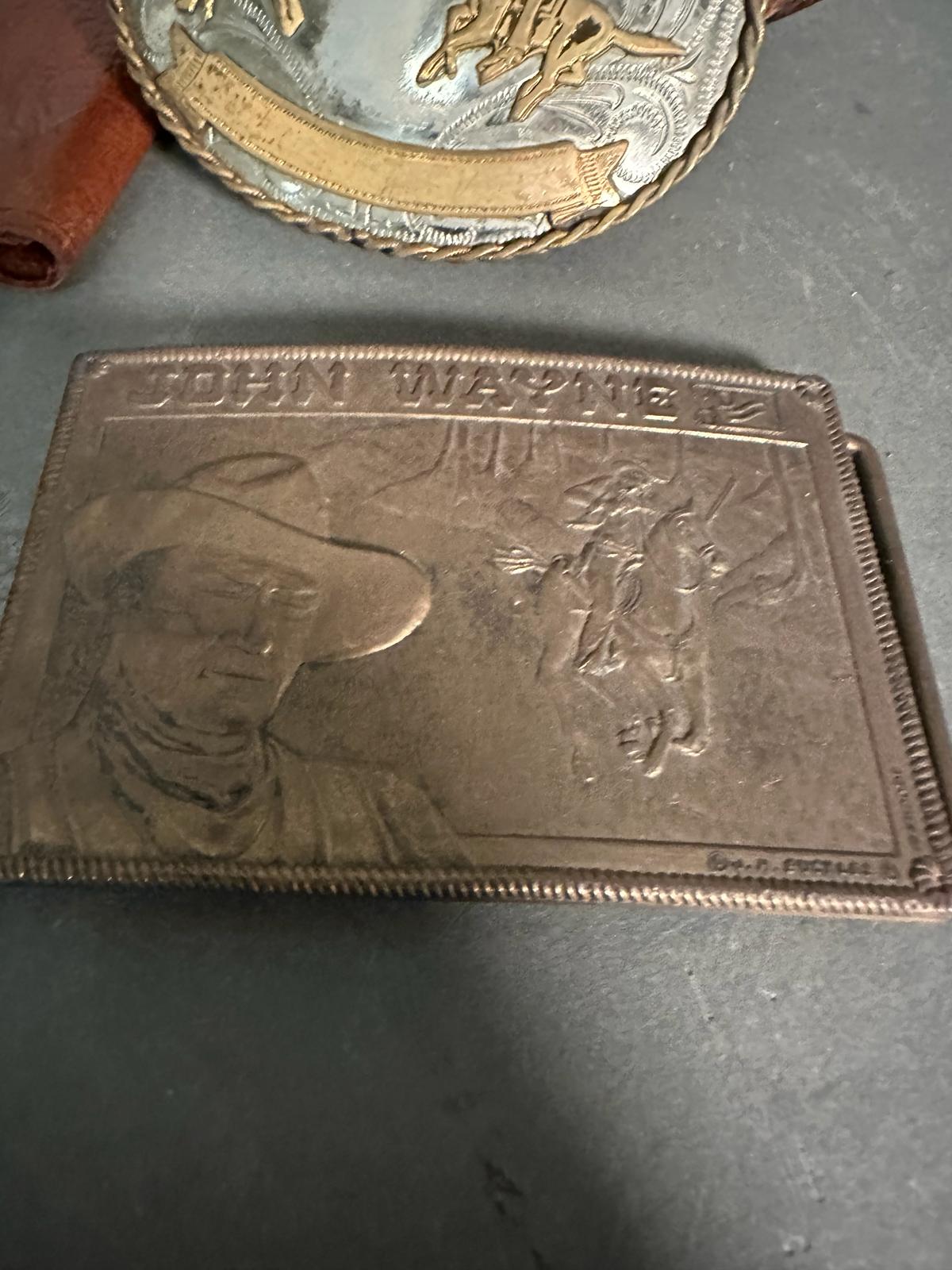 A selection of vintage leather goods and belt buckles to include cowboy belts, wallets and a - Image 3 of 7