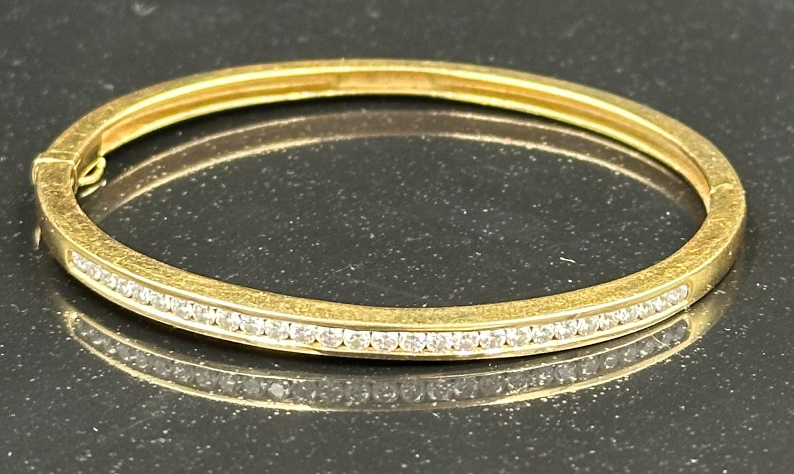 Channel set diamond bangle mounted in 18ct gold. Signed Tiffany & Co. Total diamond weight - Image 2 of 2