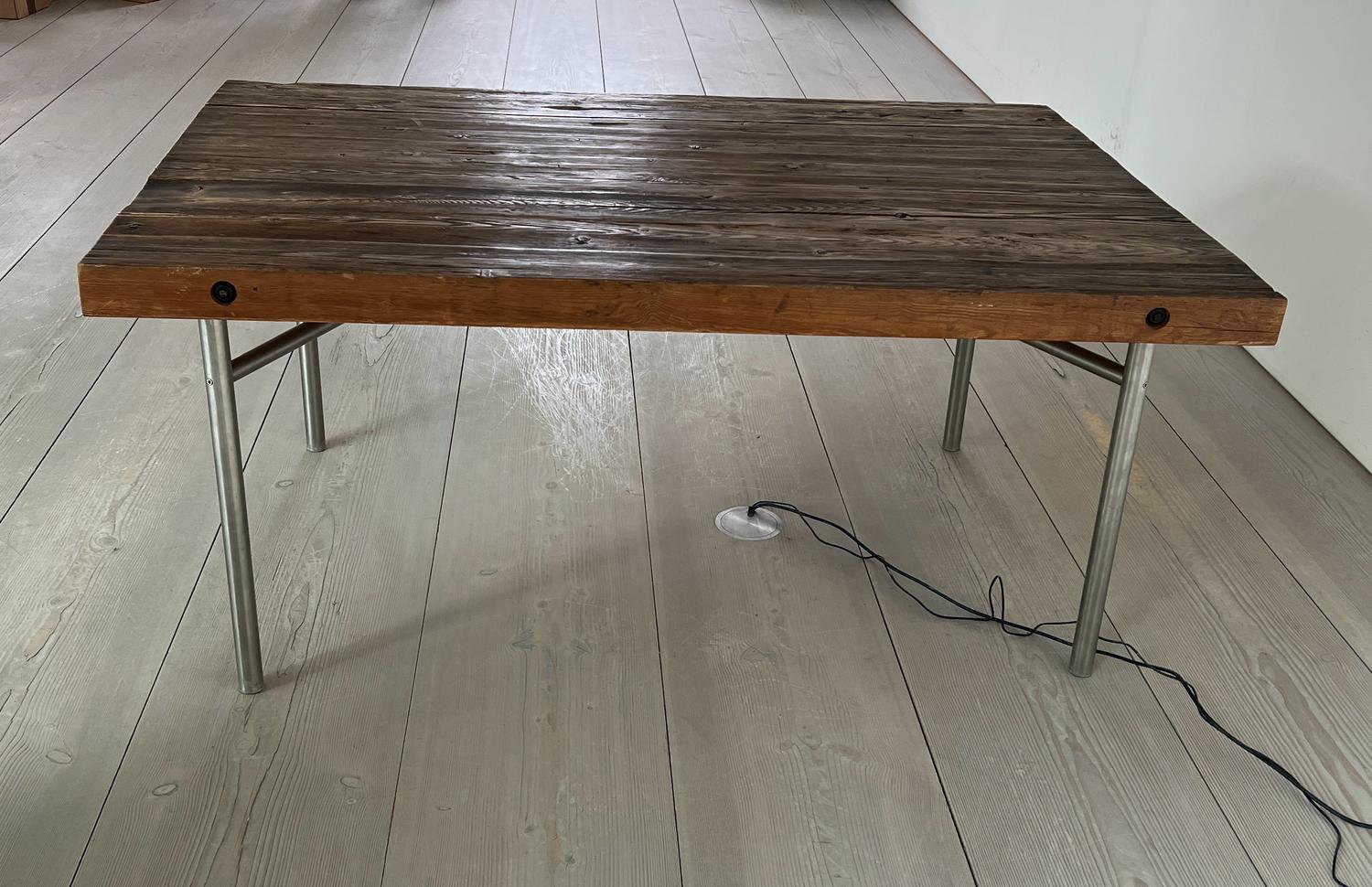 A large oak reclaimed table with plank top and chrome legs (H80cmD120cm W180cm)