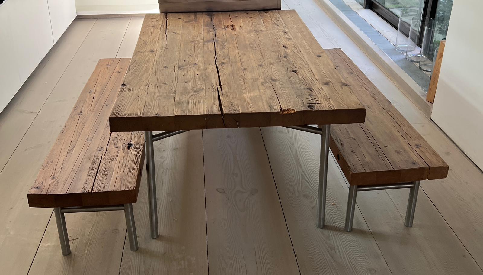 A solid oak reclaimed table with plank top and bench seats on chrome legs (H81cm W180cm D118cm) (