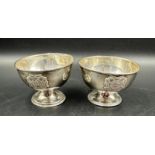 Two silver christening bowls, hallmarked for Birmingham 1909 (Total weight 52.7g)