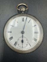 A silver pocket watch hallmarked for Chester 1906