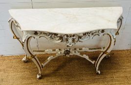 A Rocco style console table with marble shaped top (H84cm W130cm D44cm)