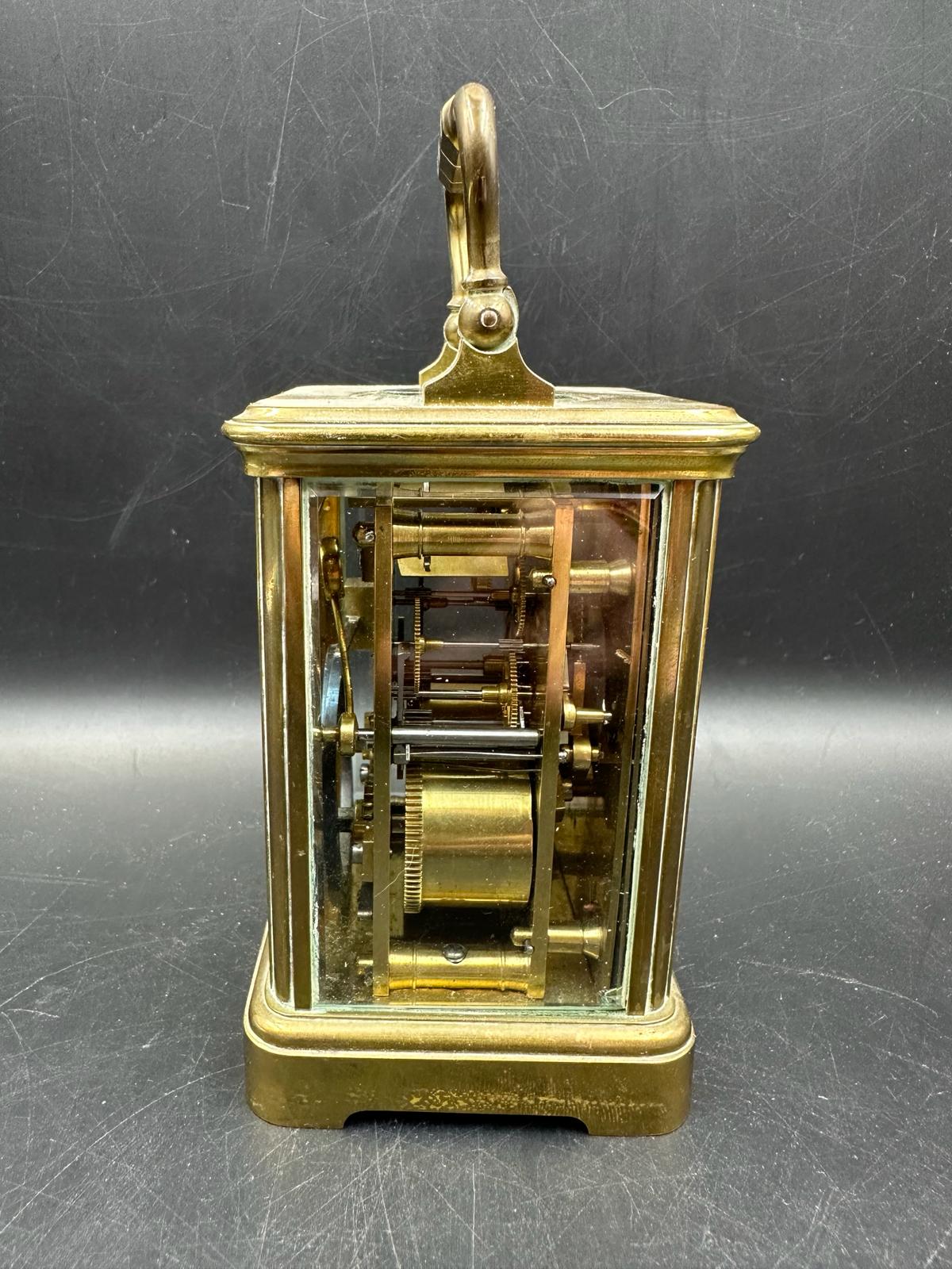 A French brass cased carriage clock with glass panes to side and back - Image 3 of 5