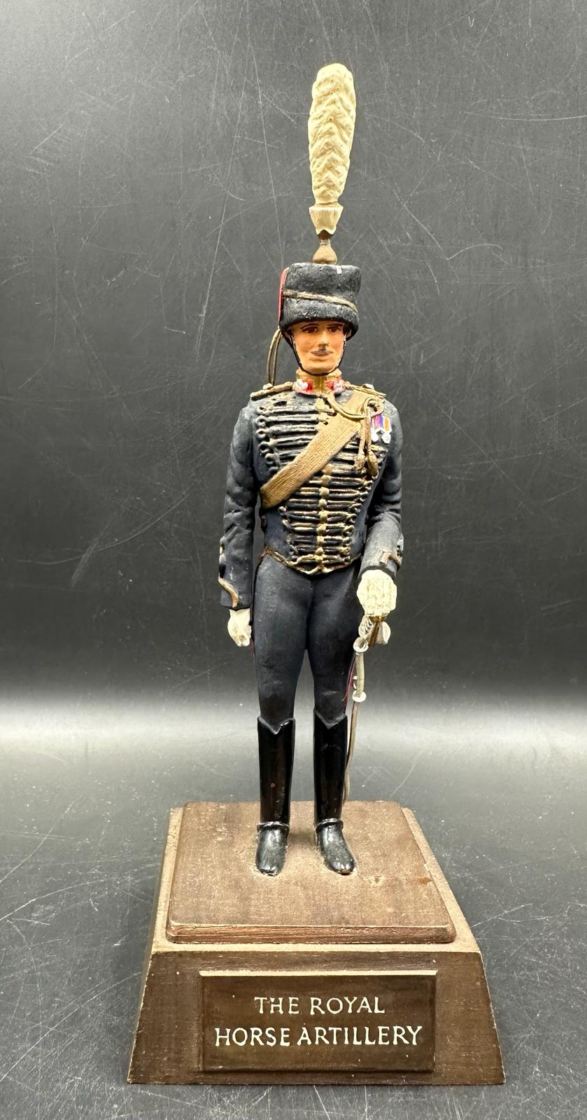 A Royal horse Artillery figure on pedestal