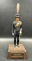 A Royal horse Artillery figure on pedestal