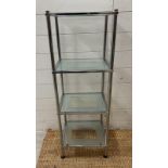 A chrome and frosted glass four shelve unit (H97cm W37cm D29cm)