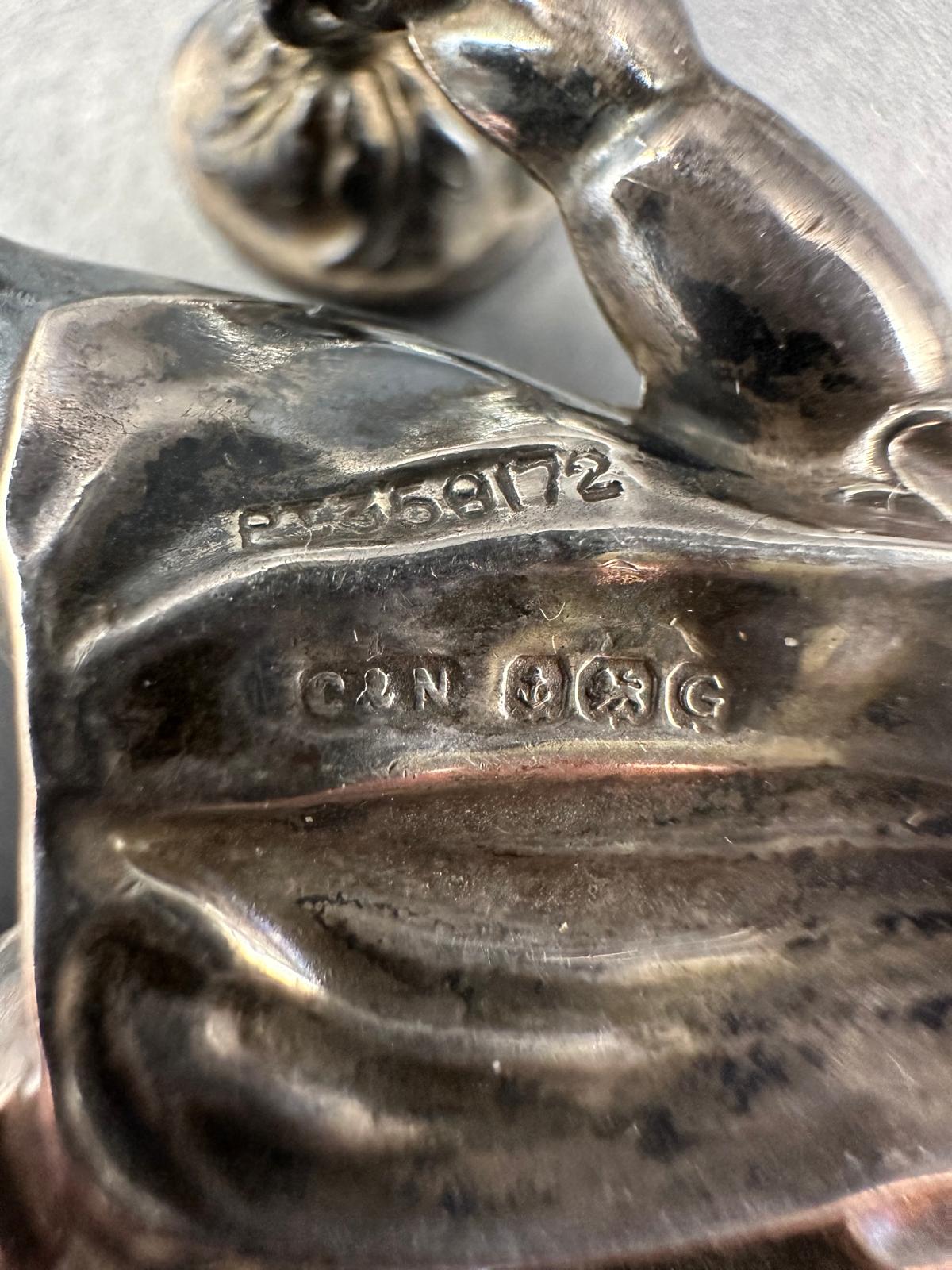 An antique silver babies rattle by Crisford & Norris Ltd, hallmarked for Birmingham 1931 - Image 3 of 4