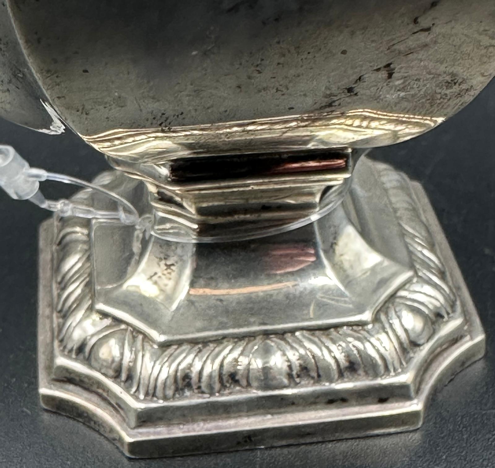 A silver sugar shaker with indistinct hallmarks approximate weight 157g and hallmarked for London - Image 3 of 3