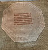 An octagon Tibetan wool rug 4ft x 4ft Condition Report marks to wool, no rips or repairs