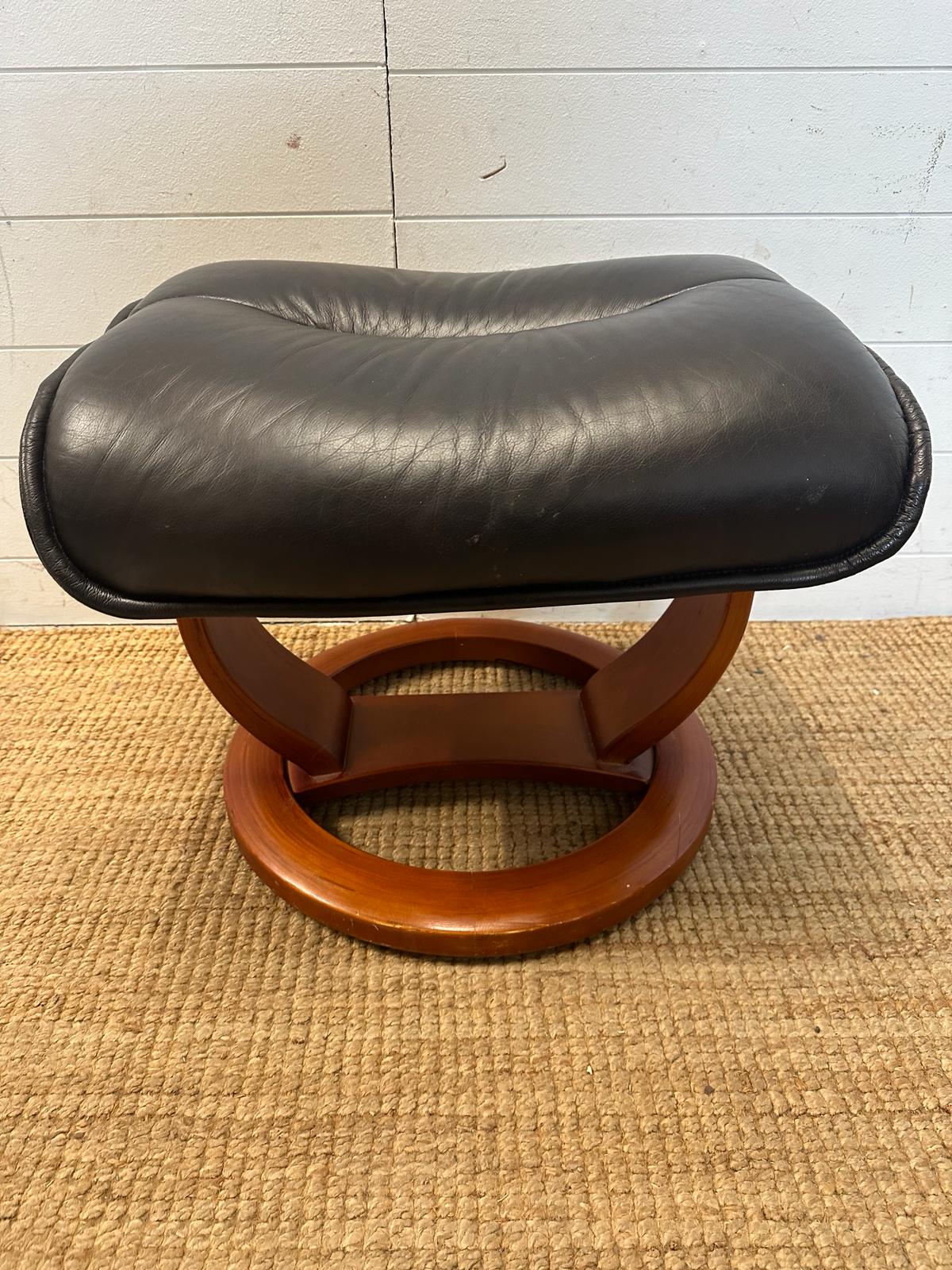 A black leather ergonomic stressless arm chair and matching foot stool - Image 2 of 5