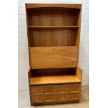 A Mid Century Nathan bookcase bureau with two door cupboard under, fall opening to reveal desk