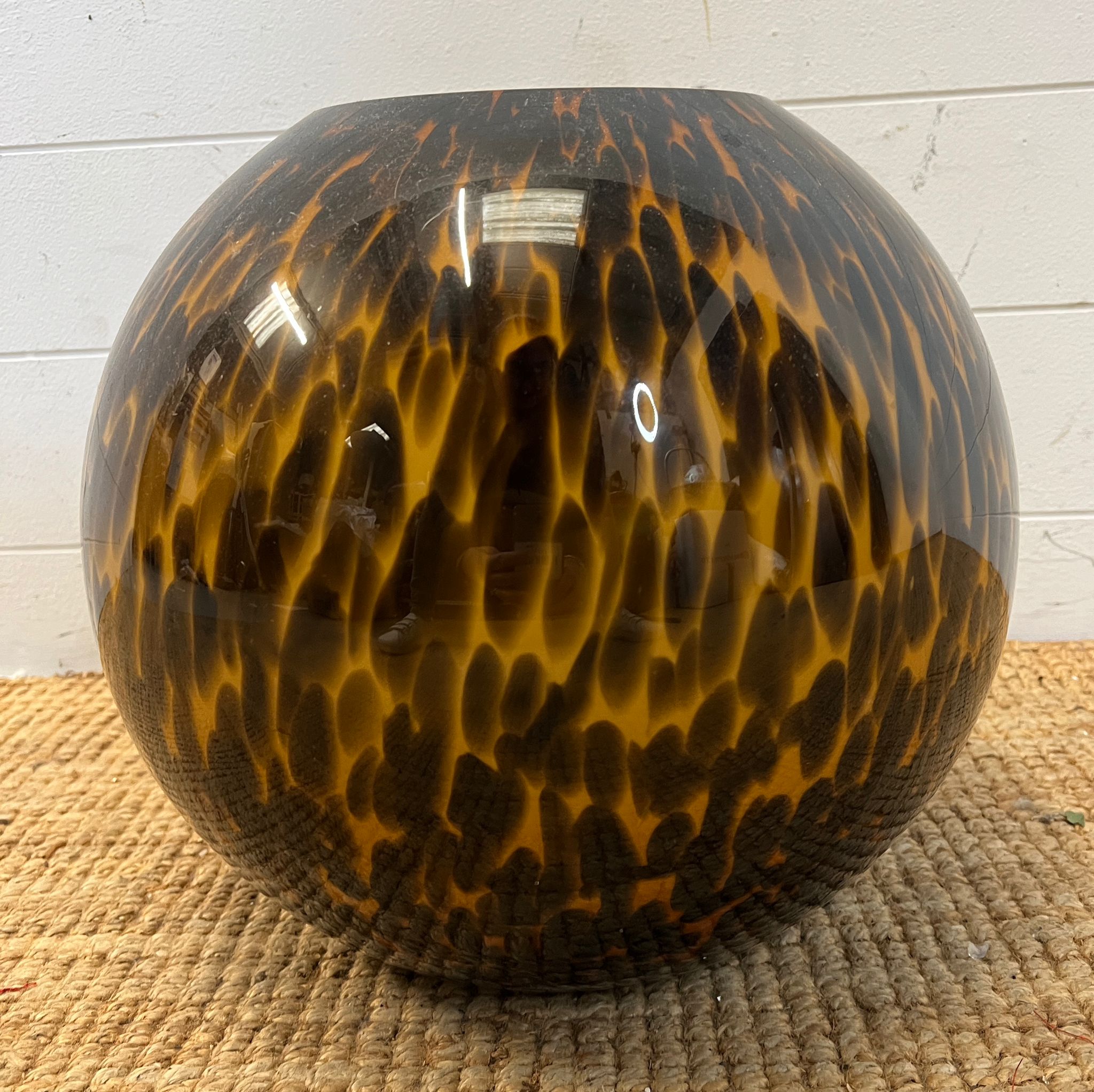 A large globe style vase in a tortoise shell pattern H31cm