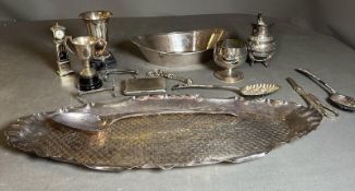 A quality selection of silverplated items to include a fish scale tray, knife rests, berry spoons,