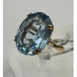 A 9ct gold and blue topaz ring. Size N