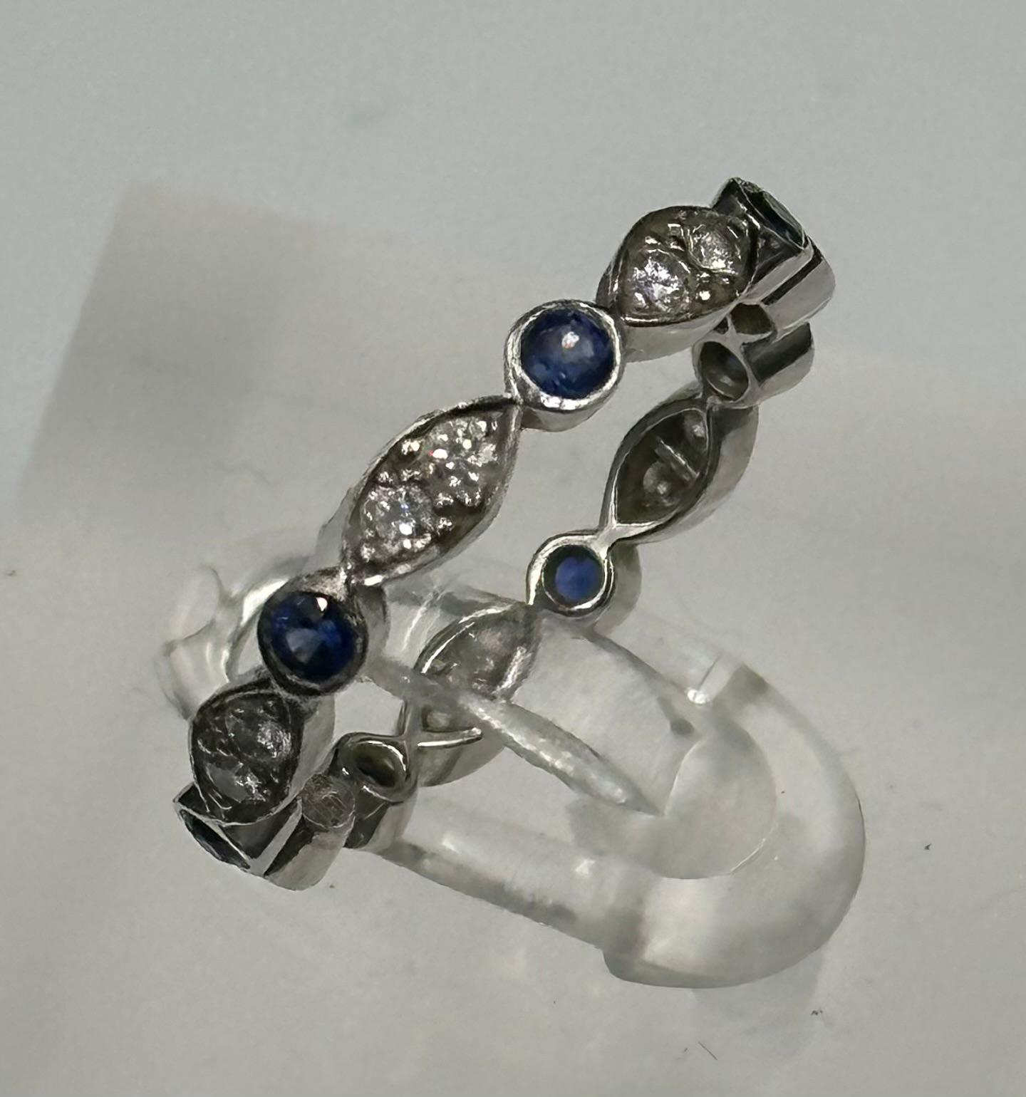 Sapphire and round diamond eternity ring mounted in platinum. Signed T&C 950. Total diamond weight - Image 3 of 3