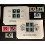 A WWII era German stamp album with a range of various stamps, denominations and issues.