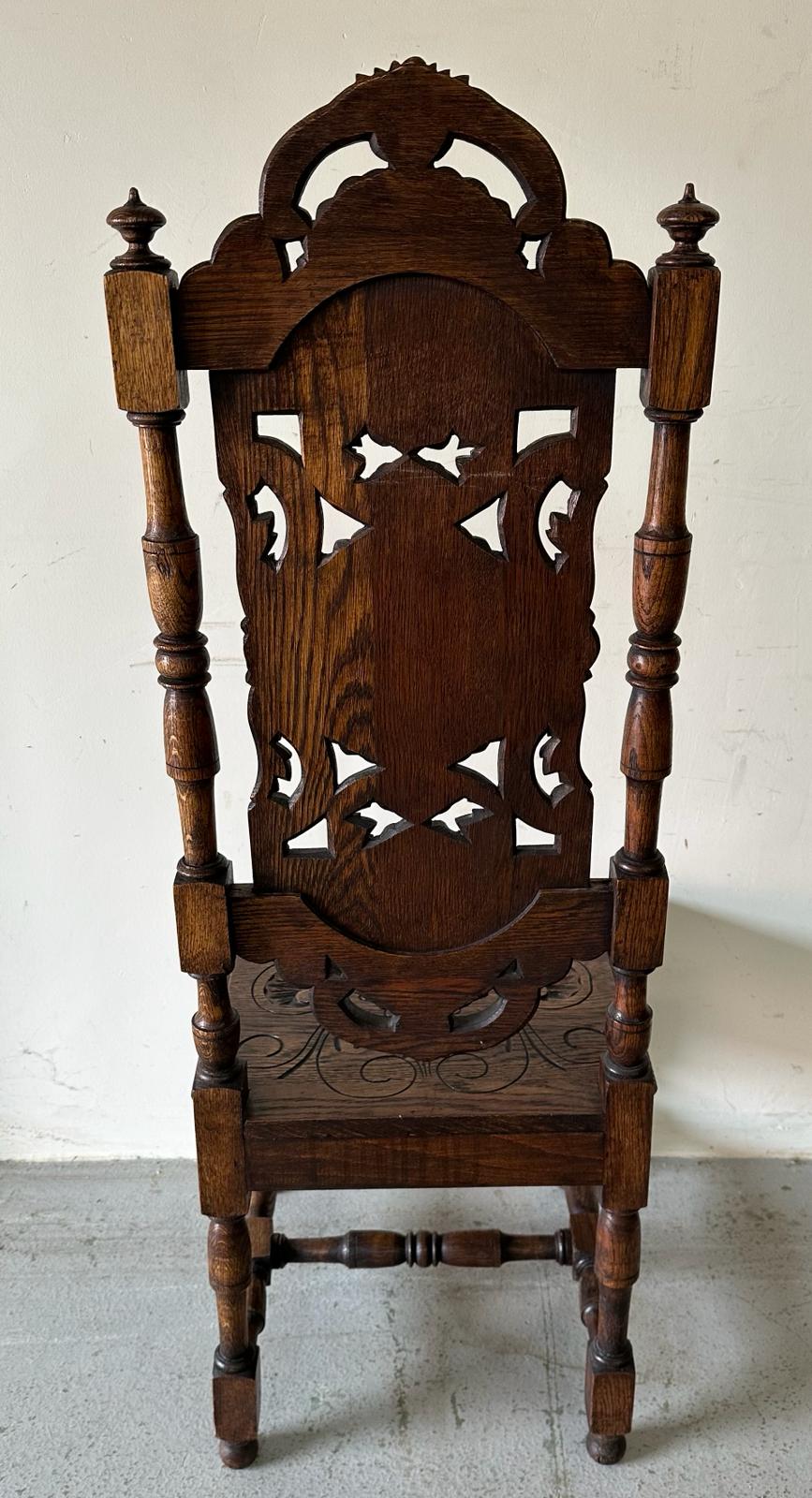 A pair of Victorian style oak hall chairs with carved seats and back, turned supports ending in - Image 4 of 6