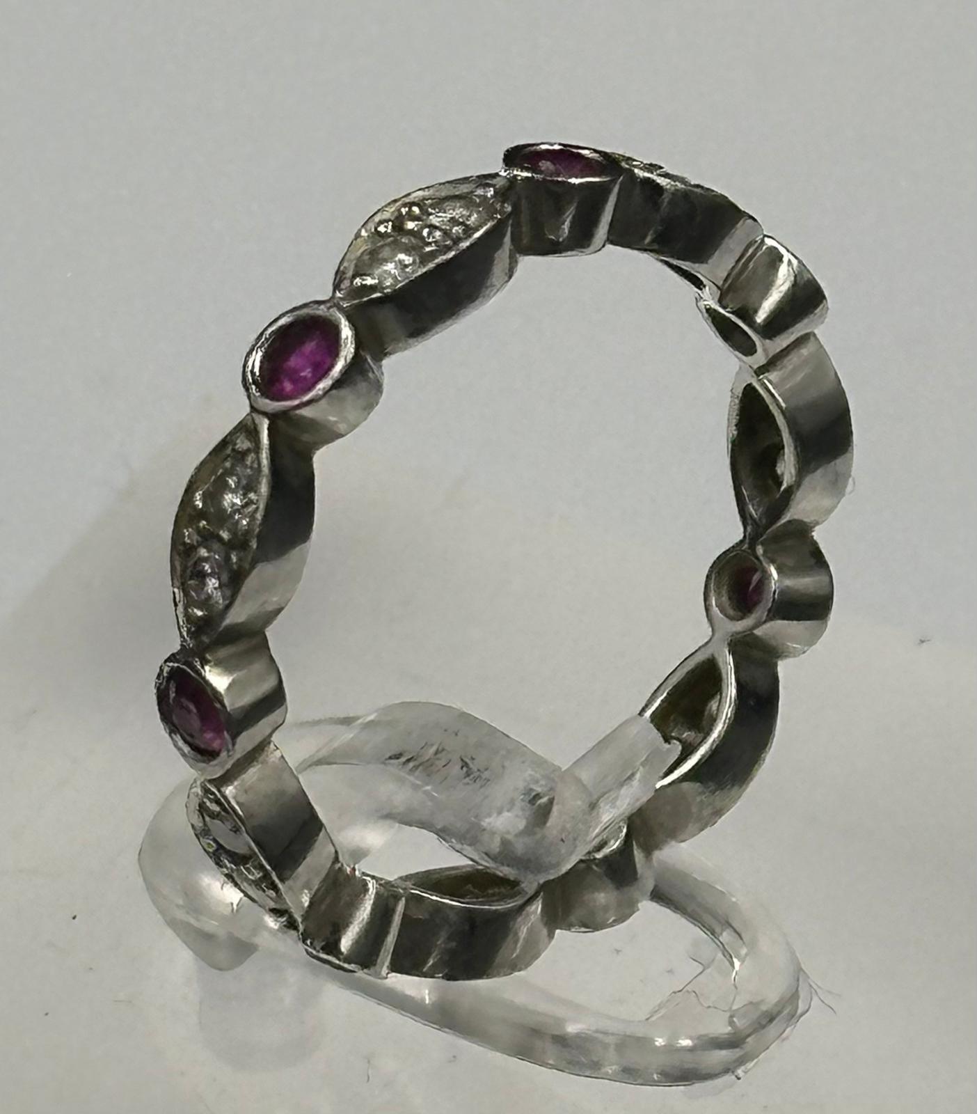 Ruby and diamond eternity ring mounted in platinum. Signed T&C 950. Total diamond weight - Image 2 of 3