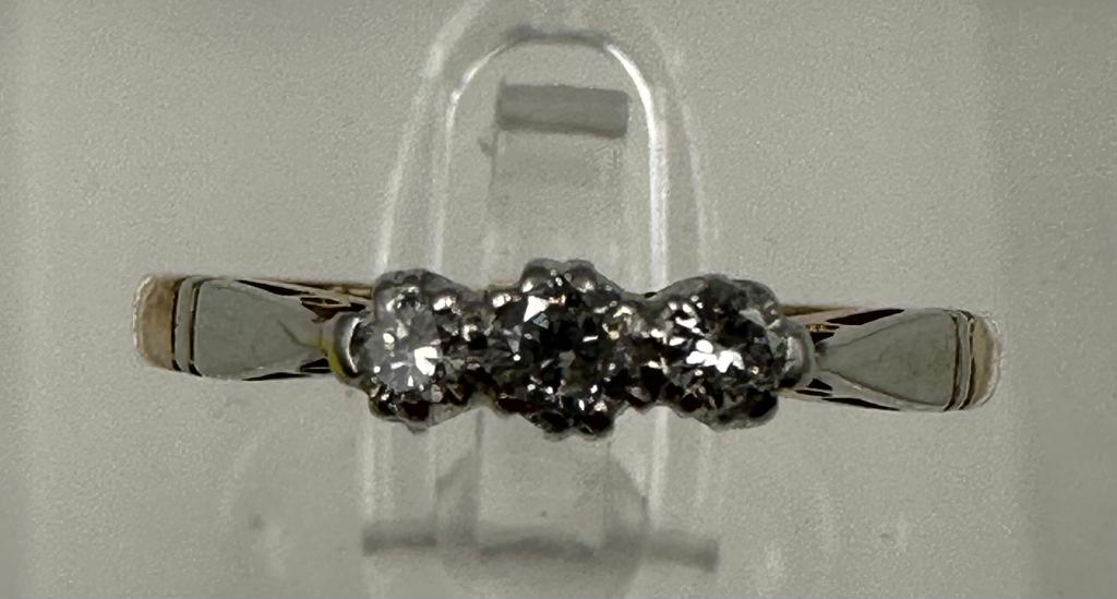 A 9ct gold and platinum three stone diamond ring, size L. - Image 3 of 6