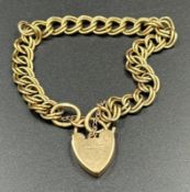 A 9ct gold bracelet with heart shaped fastener, with an approximate total weight of 14.8g