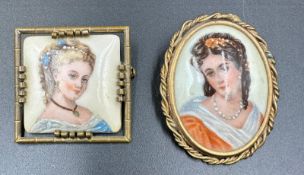 Limoges France porcelain portrait brooch pair from the mid 20th century