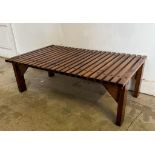 A Mid Century slatted coffee table (H32cm W96cm D58cm)