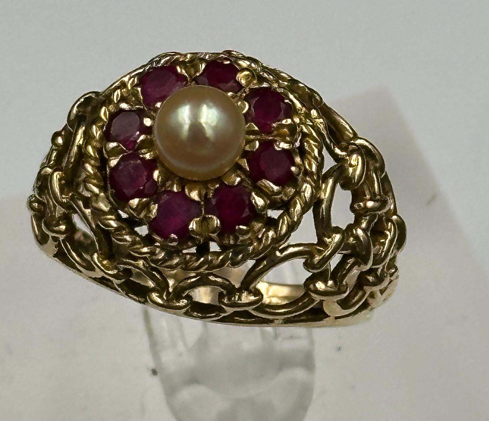 An Arabian gold cocktail ring with ruby and central pearl, approximate total weight 6.7g. - Image 2 of 3
