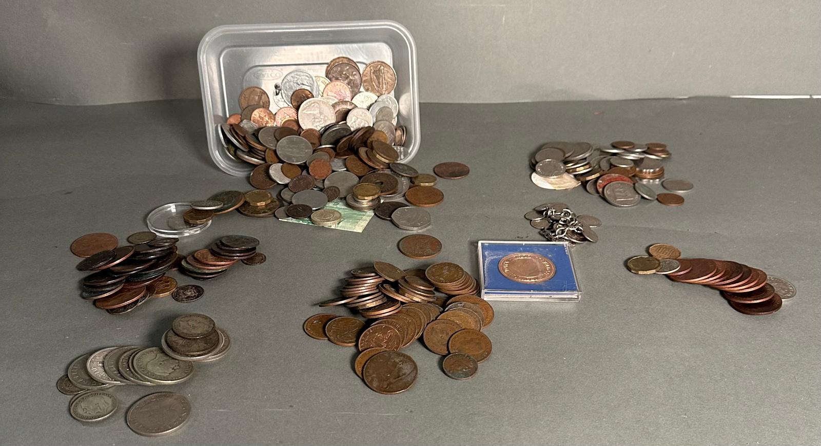 A selection of world coins, various denominations, countries and conditions, including a coin