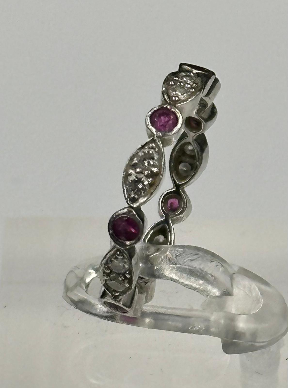Ruby and diamond eternity ring mounted in platinum. Signed T&C 950. Total diamond weight - Image 3 of 3