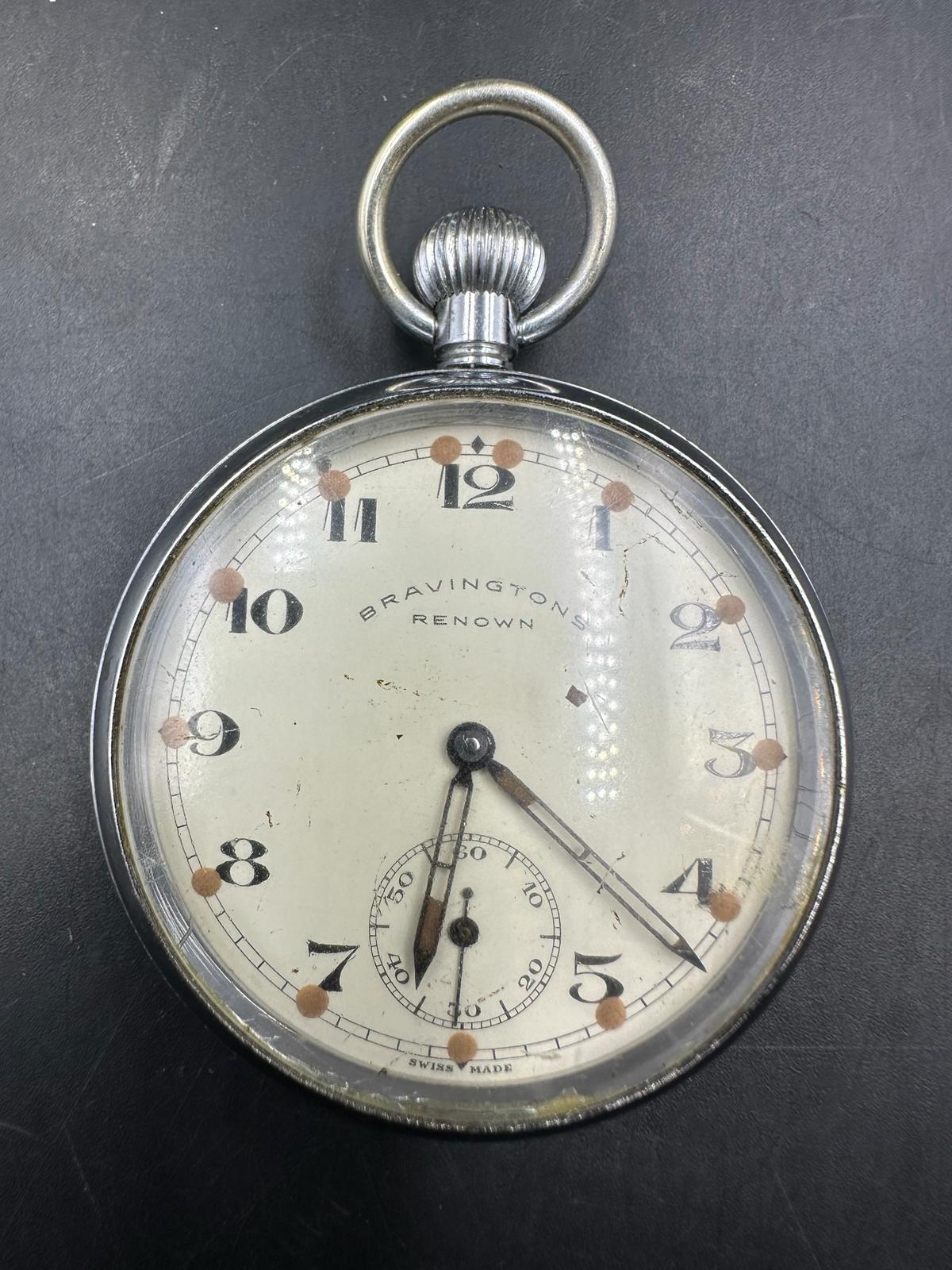 A vintage Bravingtons Renown pocket watch in a nickel chromium plated cess