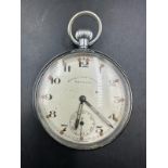 A vintage Bravingtons Renown pocket watch in a nickel chromium plated cess