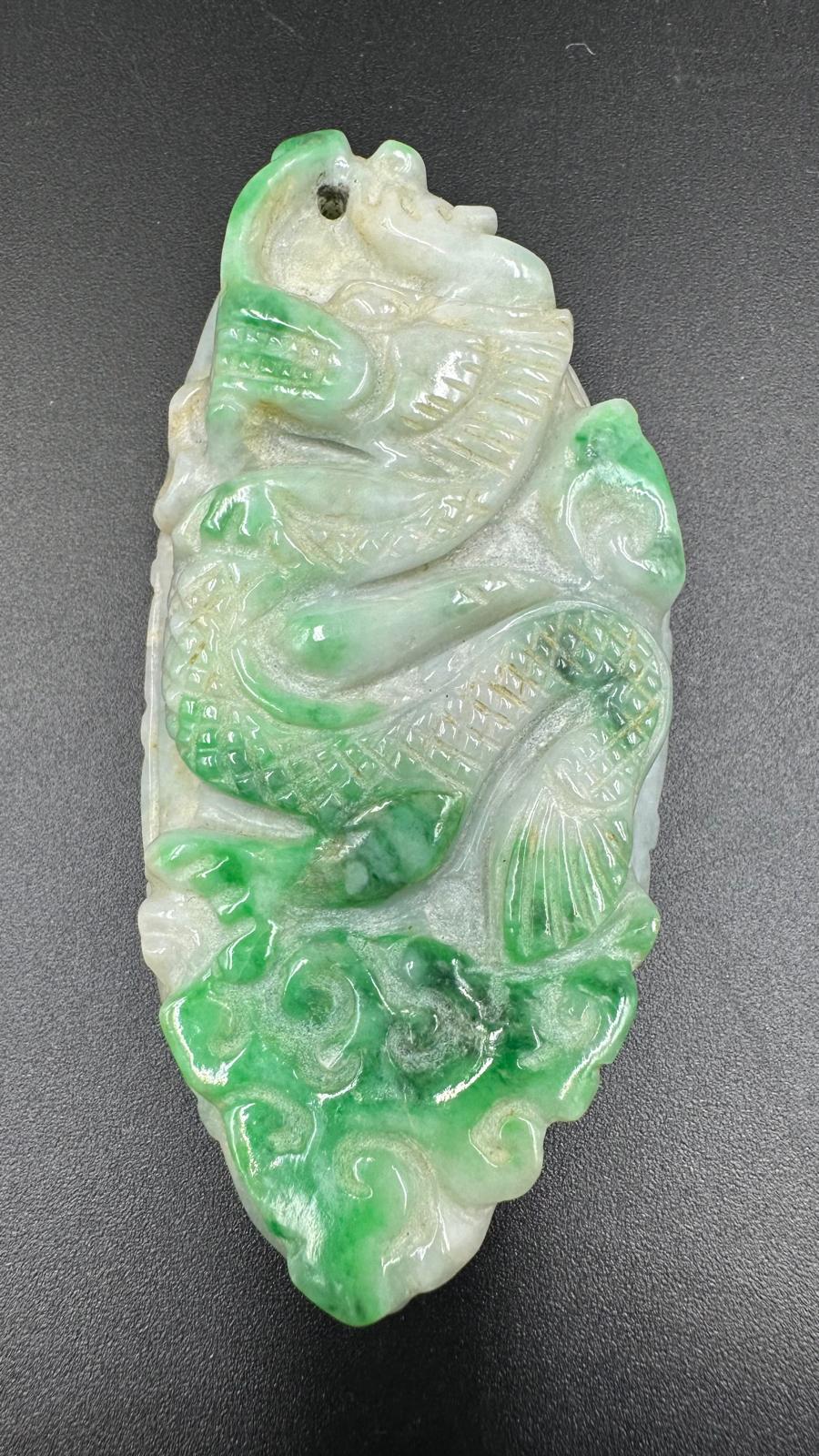 A Chinese jade carved pendant, approximate weight of 74g - Image 4 of 4