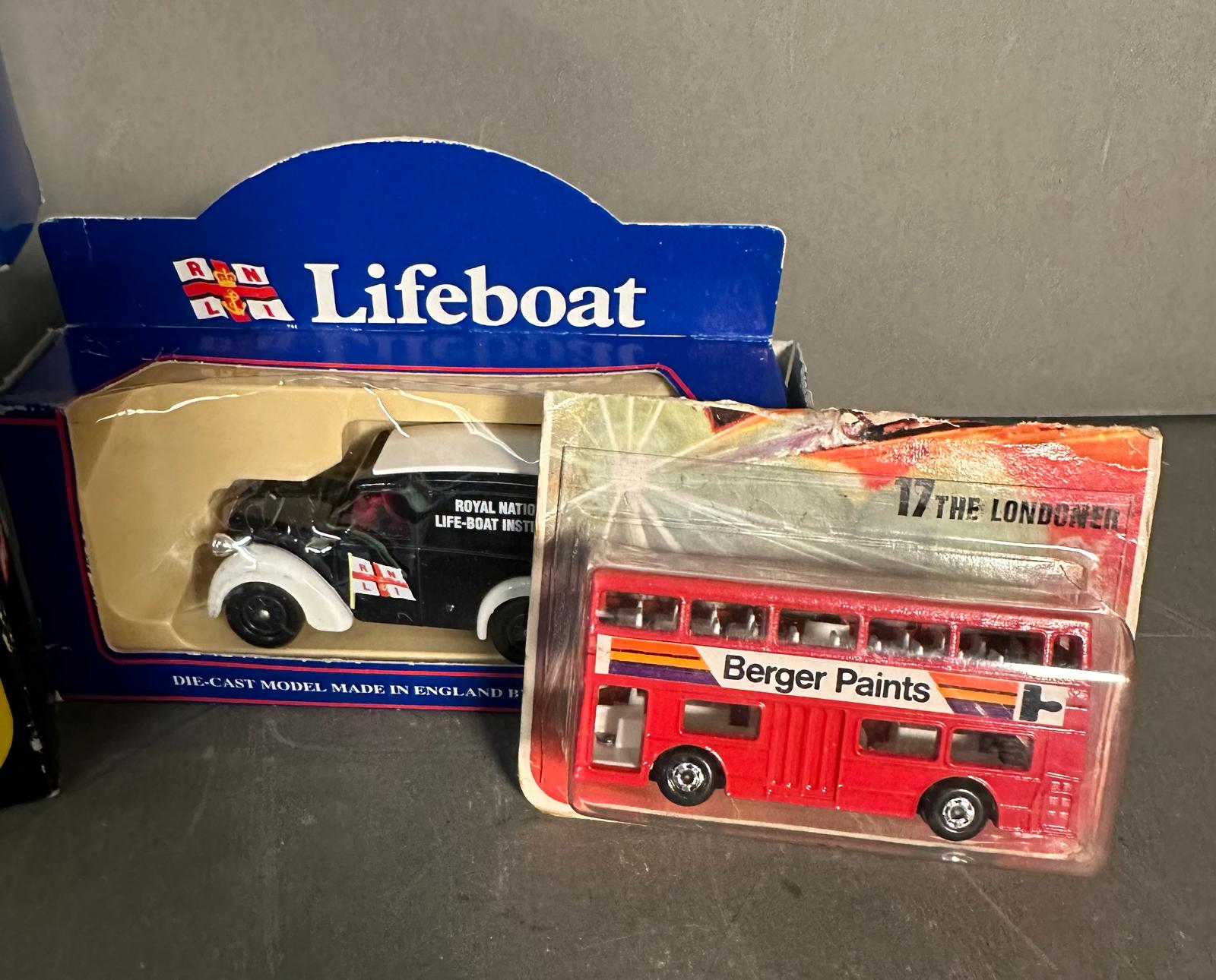Four boxed toy cars, Corgi lifeboats, a Corgi London bus and black cab and a Matchbox bus - Image 4 of 8