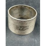 A silver napkin ring hallmarked for Birmingham 1971 and stamped T & S (Total weight 69g)
