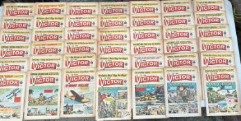 A collection of vintage The Victor comics from 1960's and 1970's