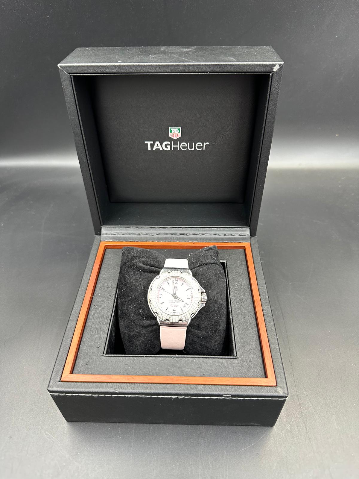 A Ladies Tag Heuer Formula 1 watch with diamond bezel, box and papers on pink leather strap with - Image 6 of 6