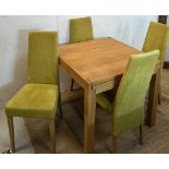 A light oak dining table and four lime green chairs (H75cm Sq85cm)