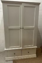 A contemporary white painted wardrobe. Two doors and two drawers under. Height 200 57x120
