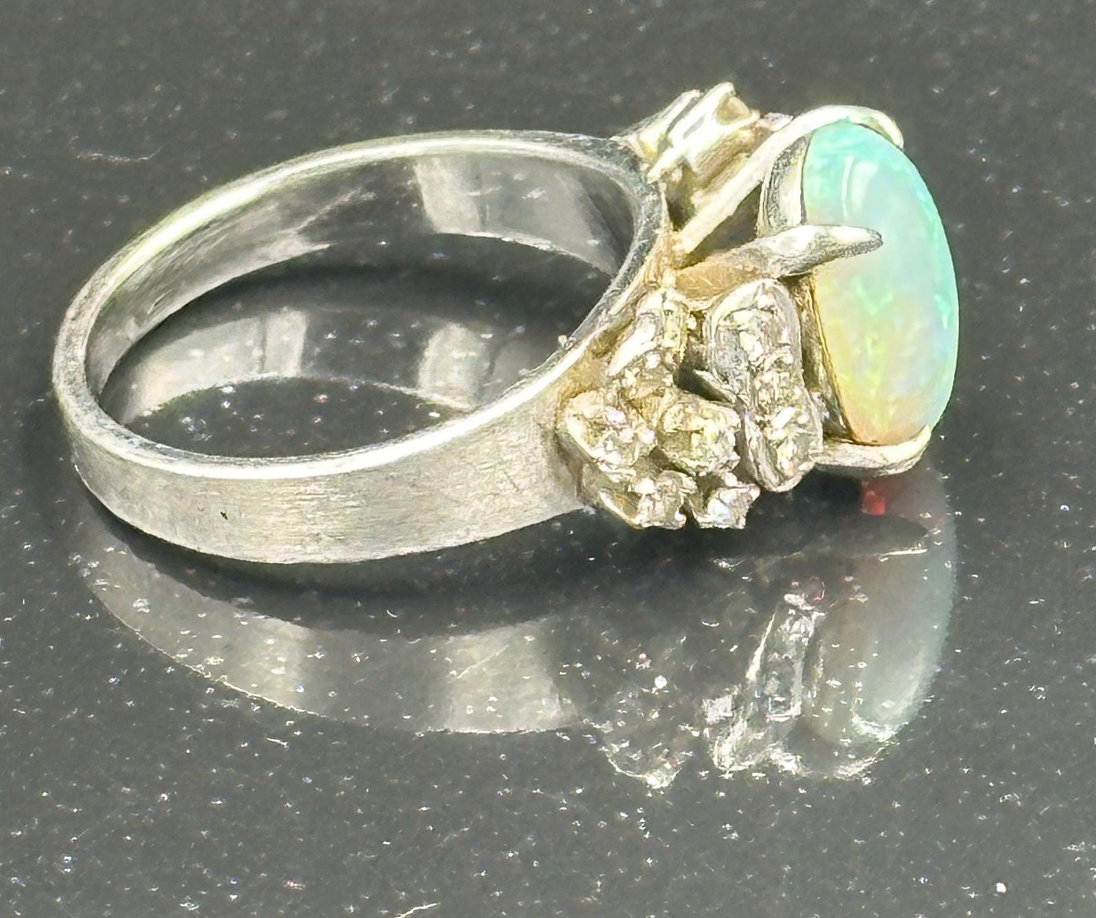 An opal and diamond ring on 14k white gold, approximate total weight 5.5g. Size L - Image 2 of 3