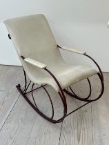 A late Victorian rocking chair, upholstered later (H92cm W102cm D53cm)