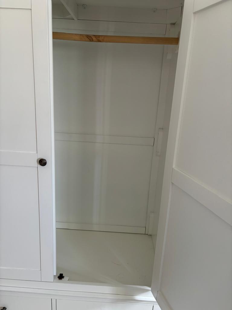 A white two door wardrobe with four drawers below and hanging space above (H200cm W114cm D55cm) - Image 4 of 4