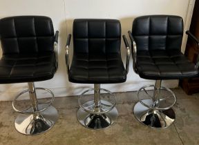 Three bar stools with leatherette exterior adjustable swivel gas lift on chrome base Condition